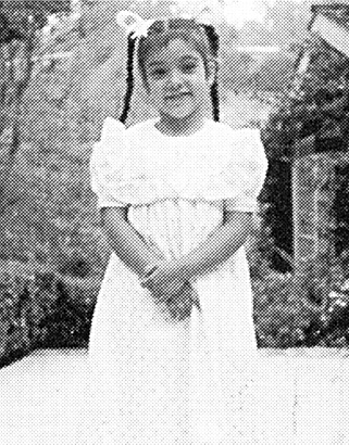 Kim Kardashian Charms the Camera Even as a Youngster young photo