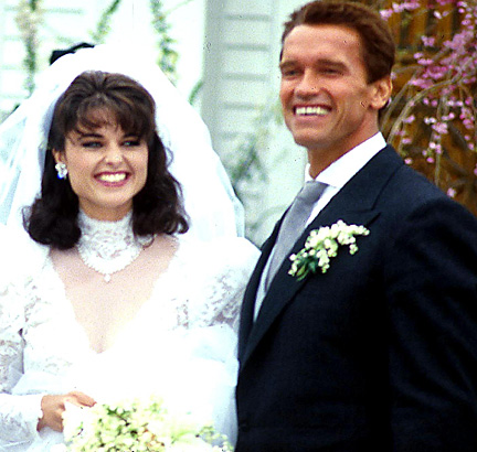 Husband Arnold Schwarzenegger and Wife Maria Shiver on their wedding day